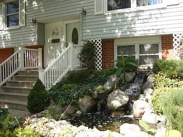 Entry with pond & waterfall