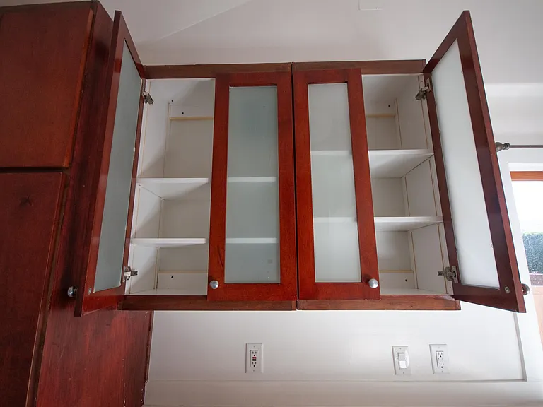 Cherry cabinets with glass facing.