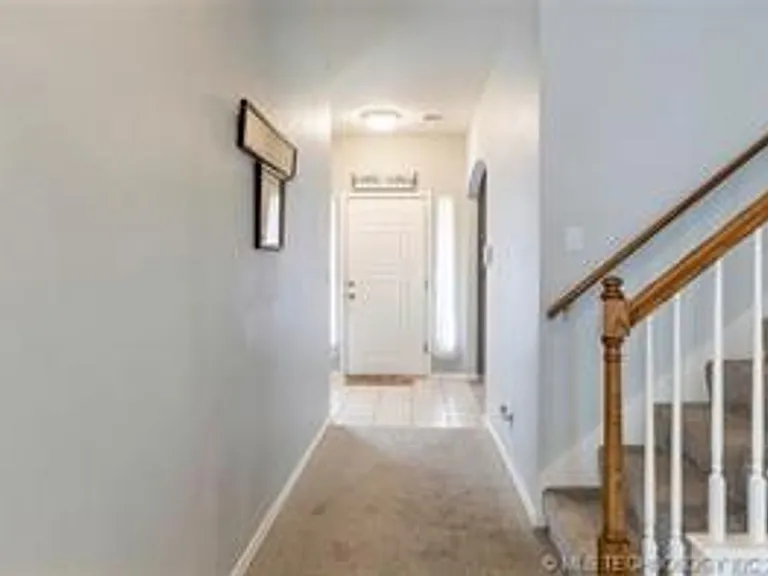 13609 E 90th Ct N — Photo 10