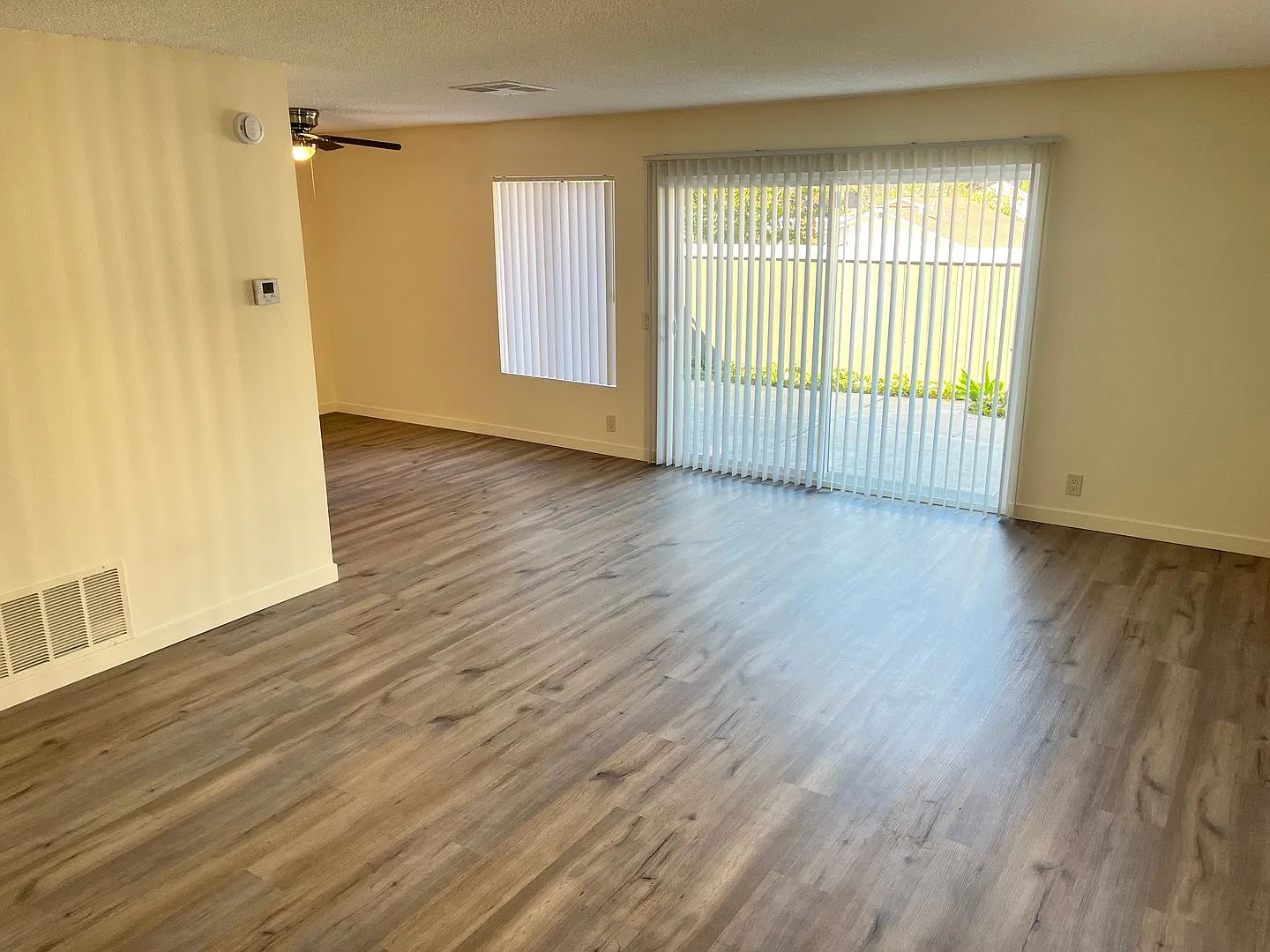 Large two-story townhouse with 3 bedrooms and 2 full baths and a private patio — Photo 2