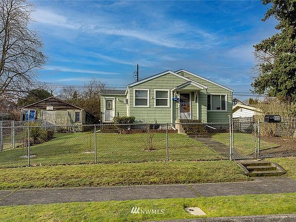 Cute home with a lot of potential on large lot in area of vintage homes being renovated.