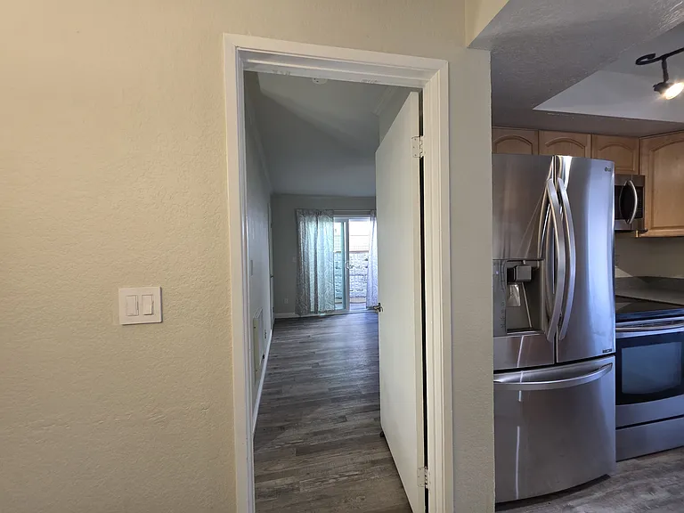 Master bedroom wing of condo with breeze flow