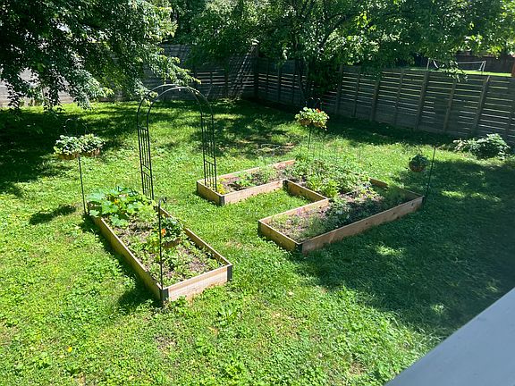 Raised beds and new dirt were installed summer 2024. Minimal effort on your part will give you vegetables, flowers, and herbs for months!