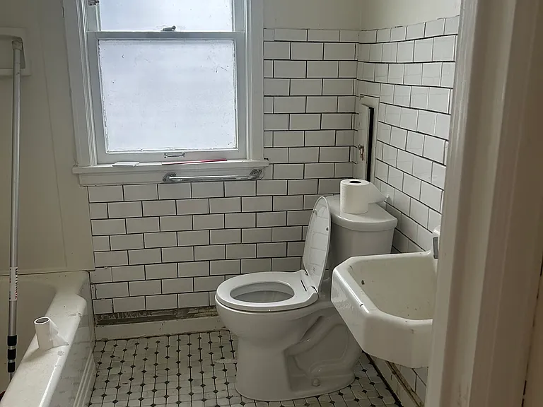 Newly tiled with a new toilet