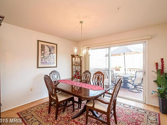 Sunny dining room with wood floors