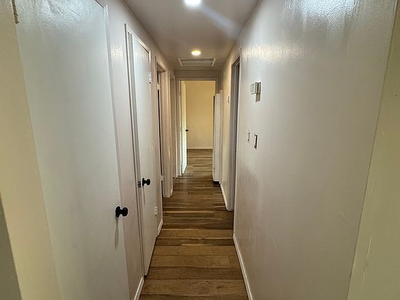 Hallway to 3 Bedrooms and 1 bathroom