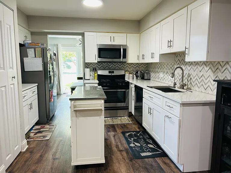 Brand new kitchen with new cabinets and quartz countertops