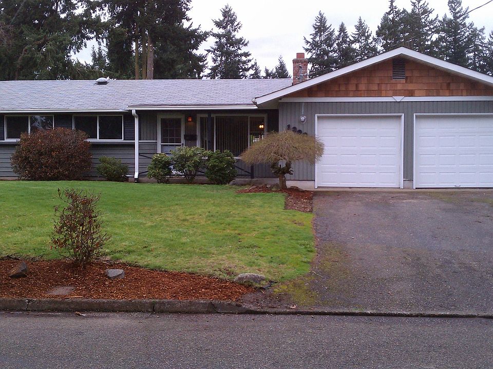 Front, new garage doors, cedar shingle