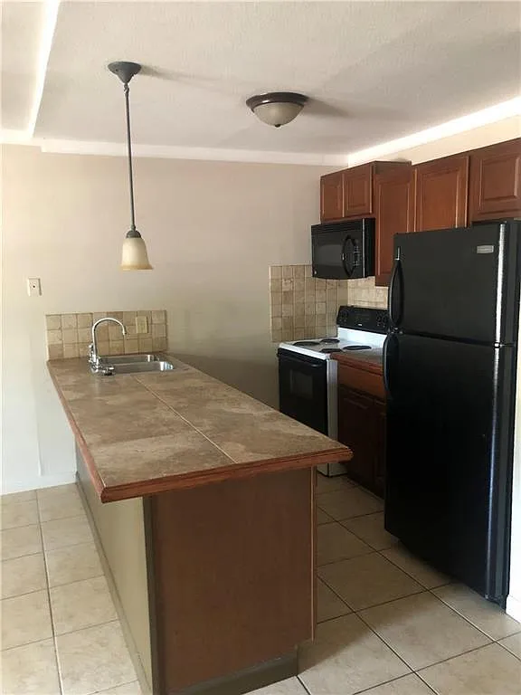Building Photo - 7007 Guadalupe St #1