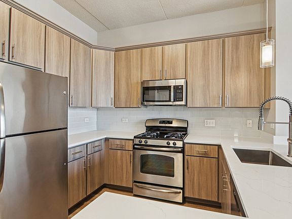 Kitchen with stainless steel finishes