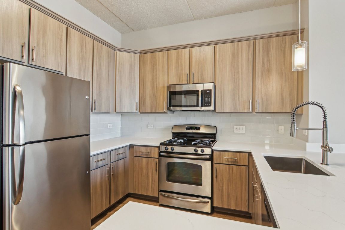 Kitchen with stainless steel finishes