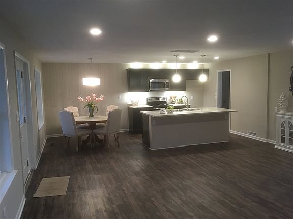 Open Living Room to Kitchen and Dining Room