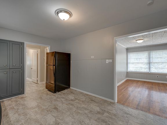 Kitchen, family room and hallway to bathroom, 2 bedrooms, and laundry room.