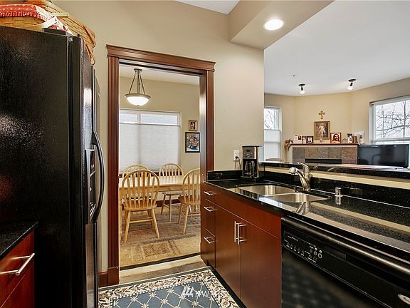 Kitchen looking through to the living room.  
