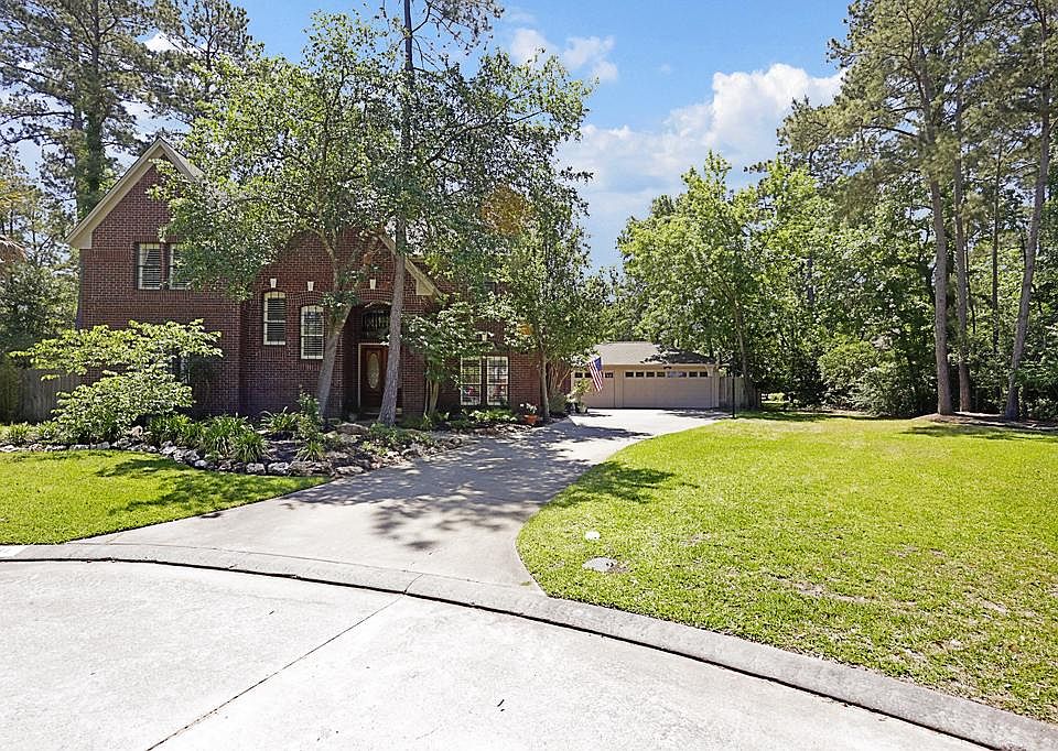 Tucked in the heart of the cul de sac, this lovely brick Leigh custom is the perfect family home.