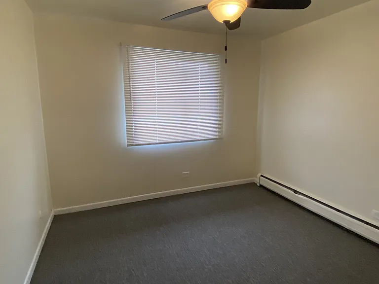 2nd Bedroom w/ Hunter Ceiling Fan & New Window Treatment