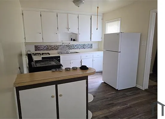 3120 E Woodrow St — Photo 4