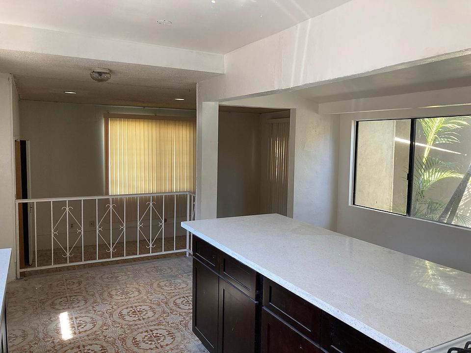 Kitchen opens up to living room