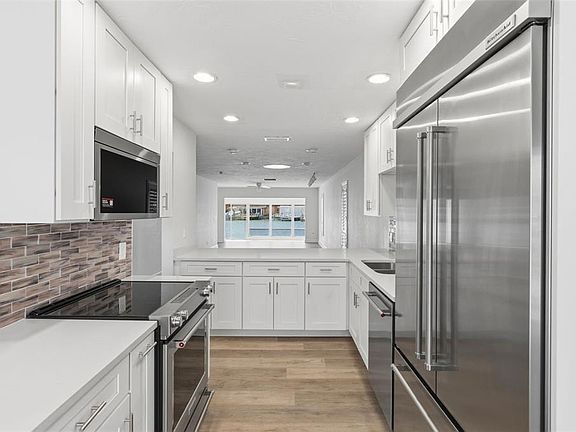 5th image of 594 BOCA CIEGA POINT BOULEVARD N