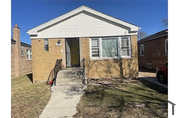 12621 S Yale Ave photo 1
