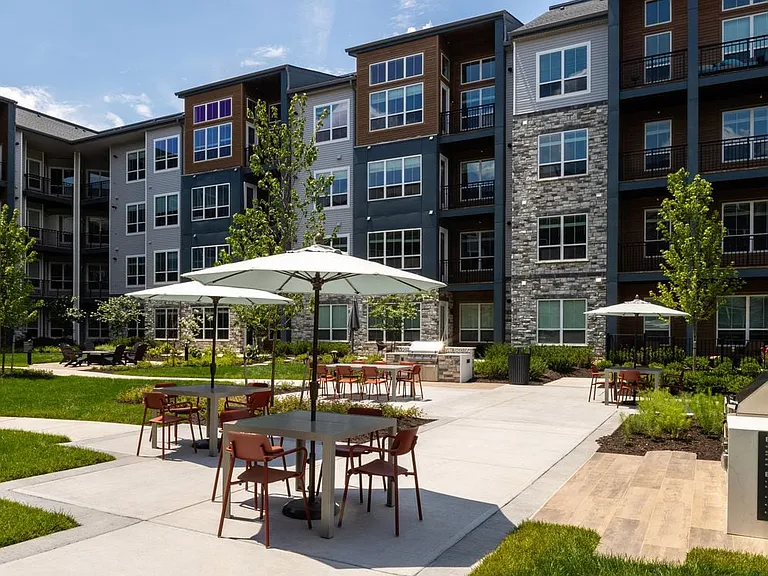 Courtyard with BBQ grills and picnic areas