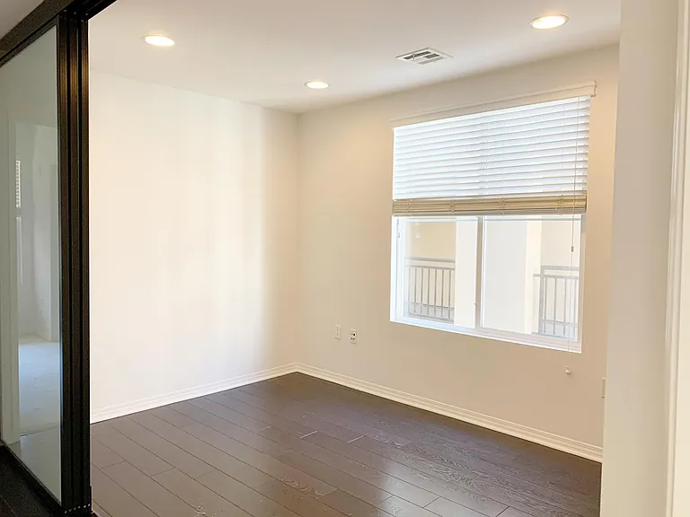 Office or Bedroom #3 with floor to ceiling opaque sliding glass doors