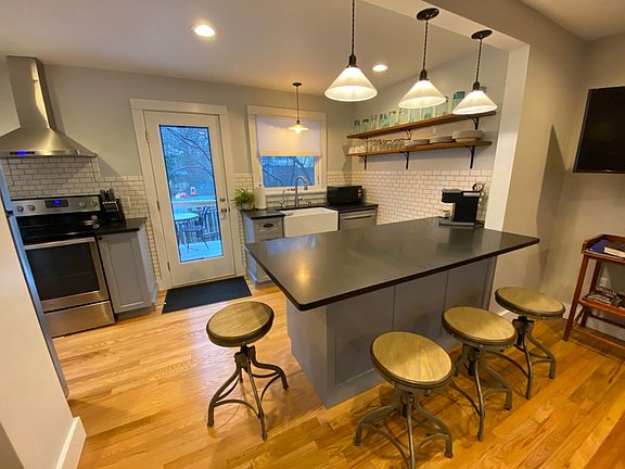 Open floor plan living space looking into kitchen