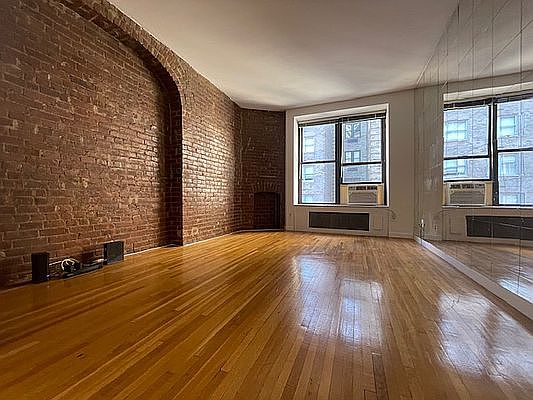 1st image of 117 W 58th St APT 12A