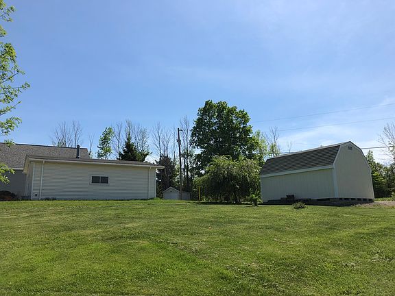 Additional garage and shed.