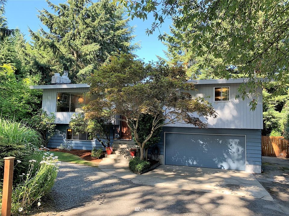Welcome Home!  Inviting main entry with plenty of parking surrounded by garden area.>