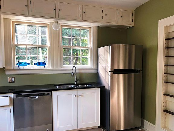 Kitchen has silestone countertops and Marmoleum floors
