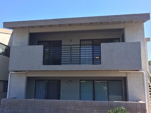 Condo is on second floor with a very large balcony. Outside storage is to the right side of the balcony.