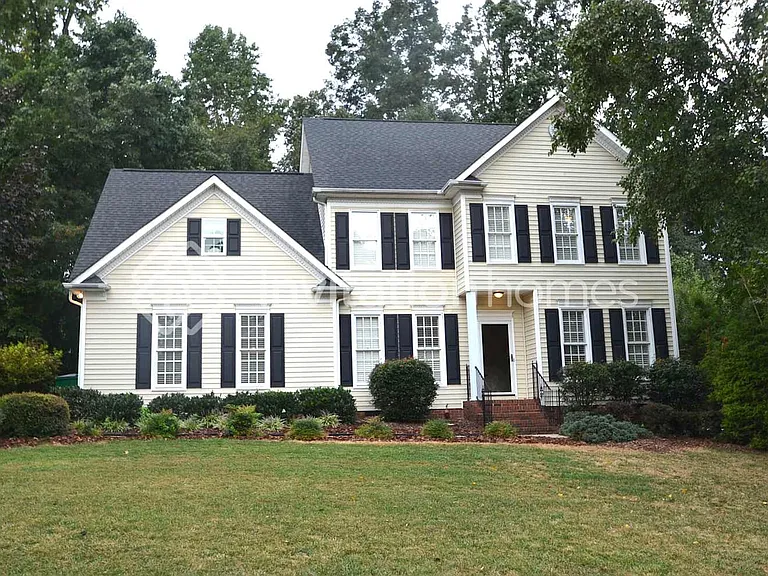 7908 Harrington Woods Rd — Photo 1