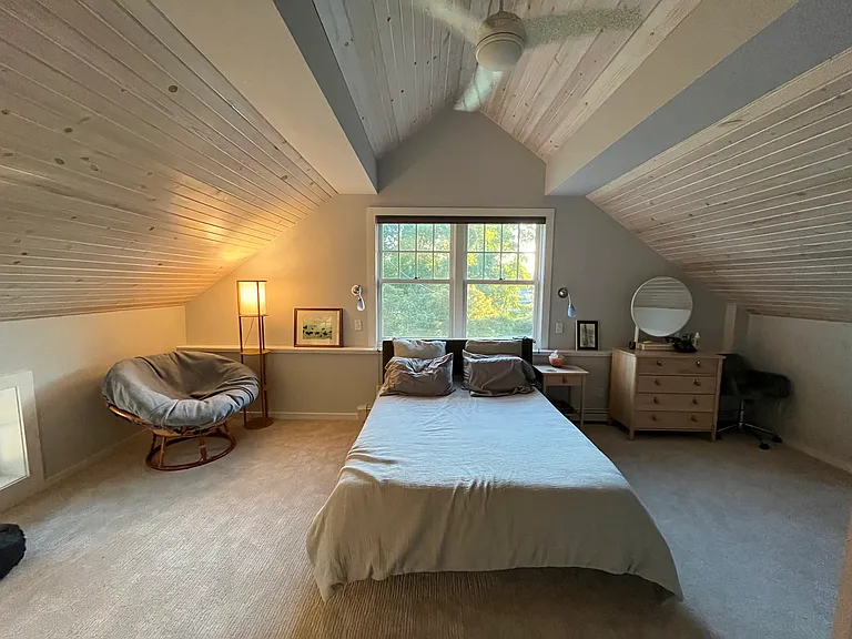 Another shot of master with actual furniture. King bed.