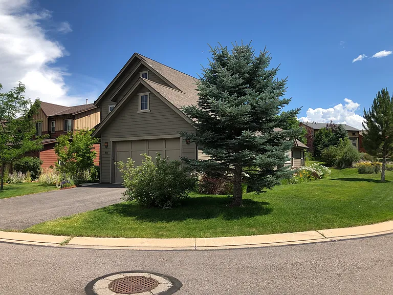Front of house with 2 car garage