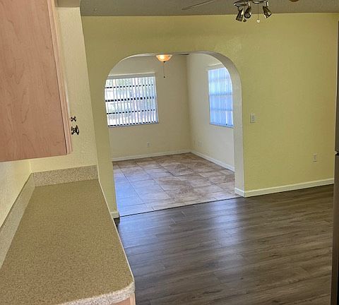 Living room into kitchen, family room