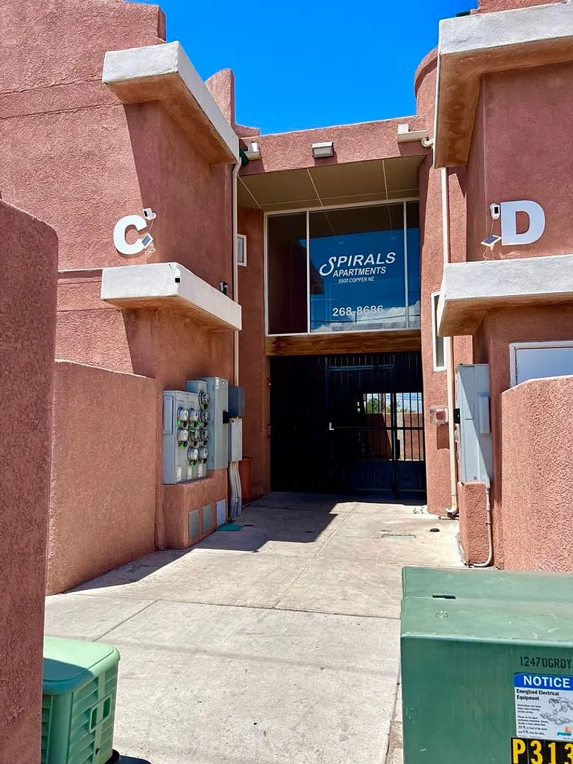 Modern Condo-Style Living Near Nob Hill & UNM $300 Off Move-In Special at The Spirals Apartments — Photo 1