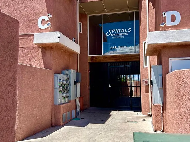 Modern Condo-Style Living Near Nob Hill & UNM $300 Off Move-In Special at The Spirals Apartments — Photo 1