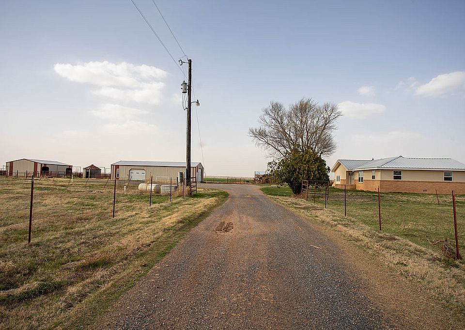 House + 4Shops + 11.48 acres