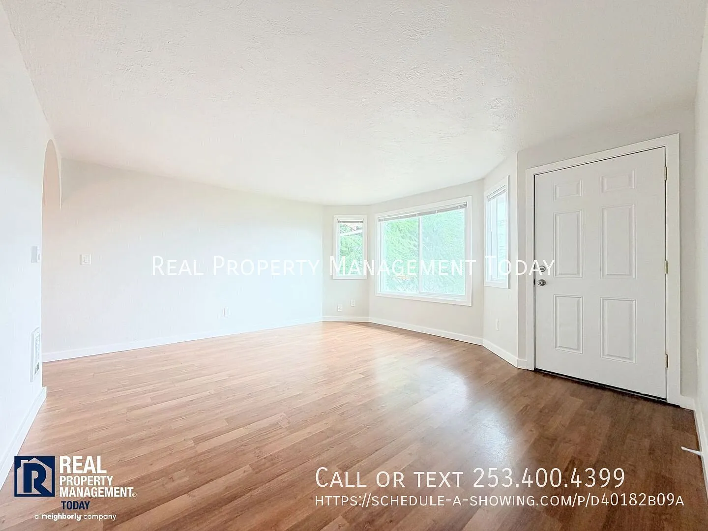 Ground-Floor 2-Bedroom Triplex Unit with Private Patio & Carport — Photo 3