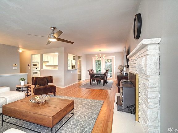 A nice open floor plan with newly refinished hardwood floors, allows for an easy transition from room to room.