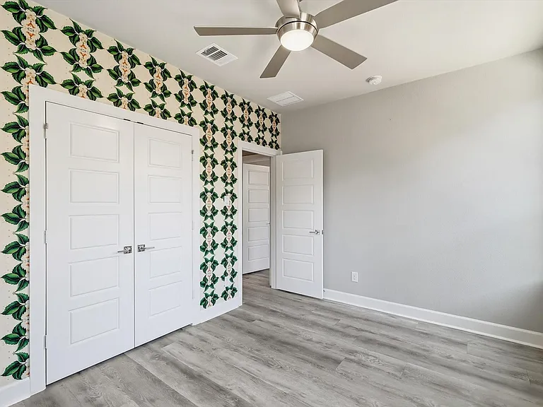 Remote controlled blinds in this bedroom