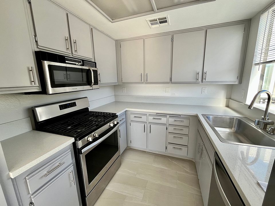 Deep sink, stainless steel appliances, and lots of cabinet space
