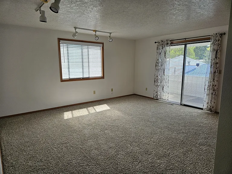 master bedroom upstairs with sliding door to patio on suite bathroom & 2 walk in closets