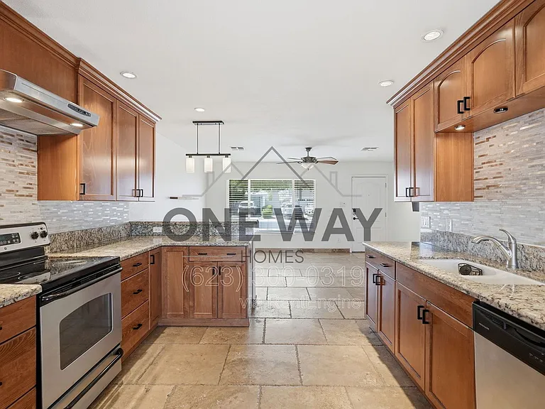 8702 E Sheridan St — Photo 11