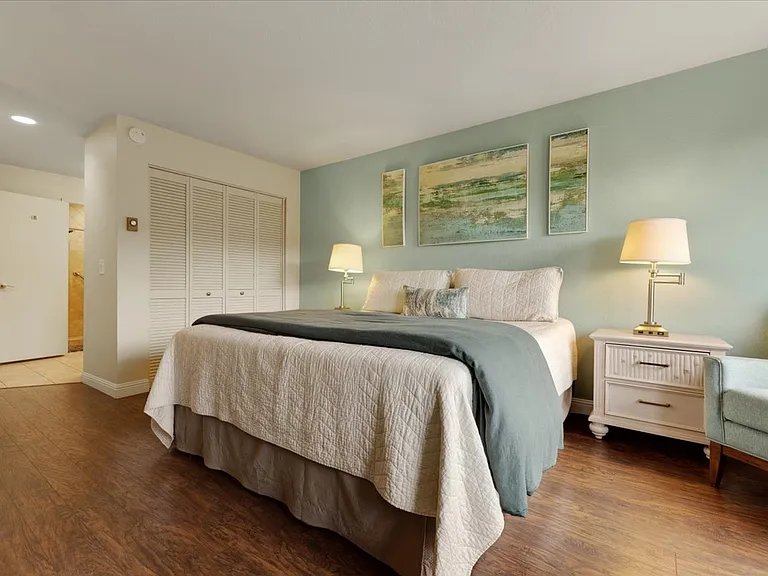 Master bedroom Suite with large closets and comforters with a 3" mattress topper for your comfort and a cozy nights sleep.
