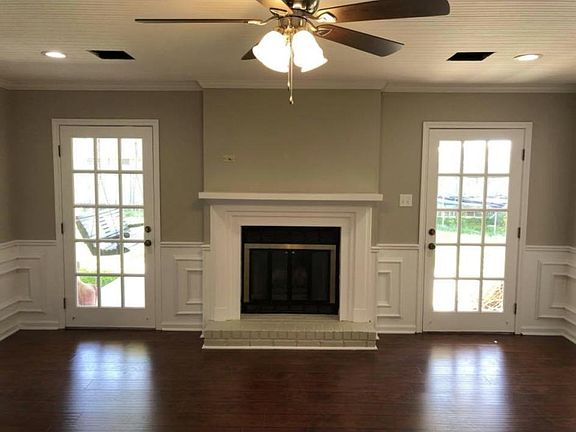 large living room that flows onto outdoor patio