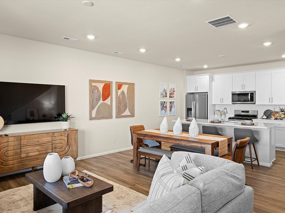 Main Living - Dining and Kitchen space - Model Home Picture (for representation of furniture layout only)