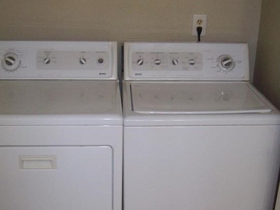 Washer/Dryer Unit in Main Floor Bathroom. There are closet