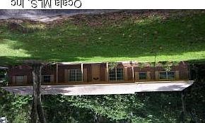 428115